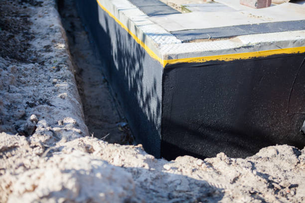 Professional Waterproofing technician working in Viola, NY